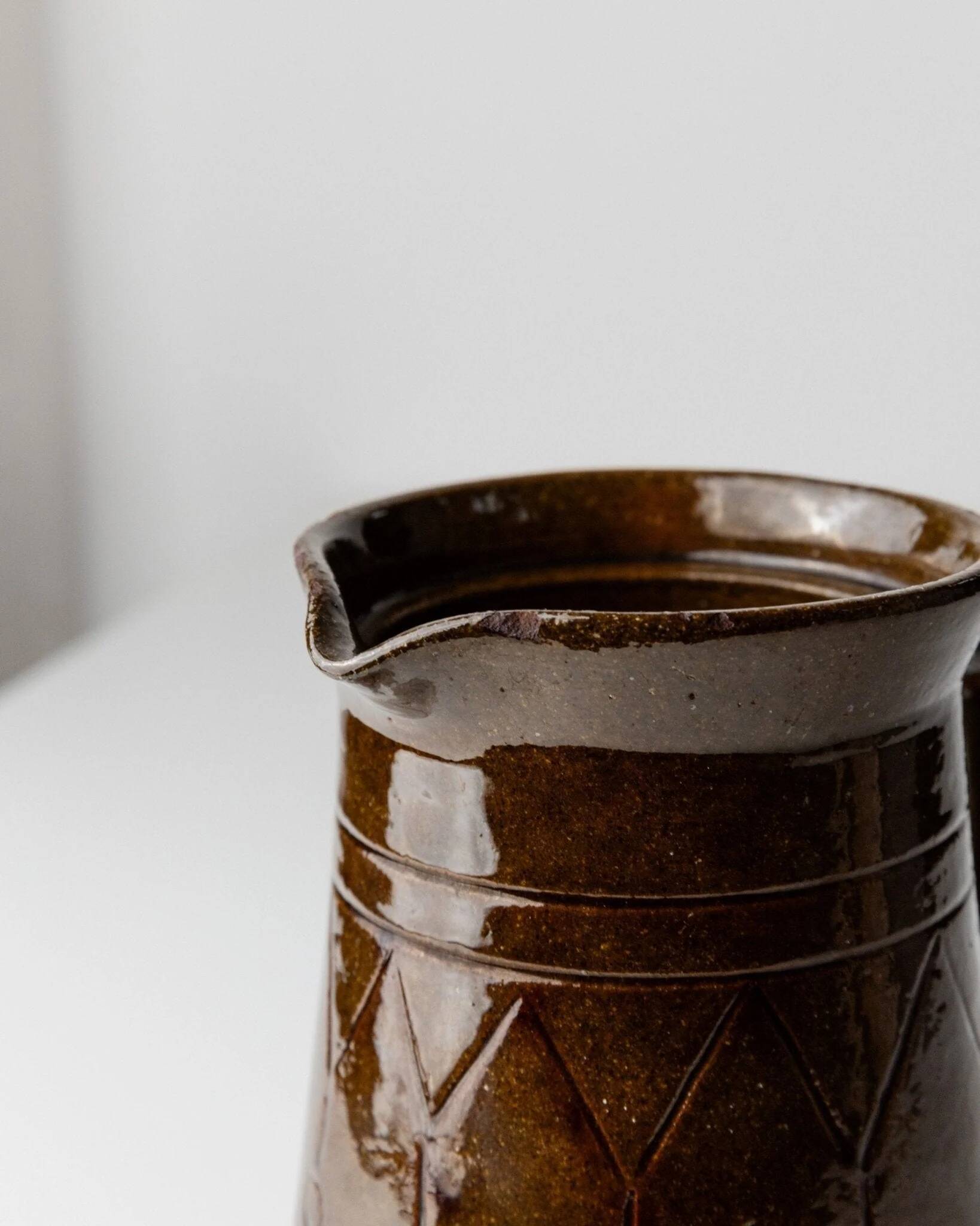 Vintage ceramic pitcher or vase with handle by Urbano Fontana, relief, brown glaze, Italy 1970s.