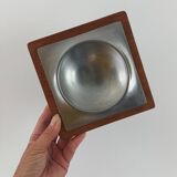 Stainless steel and wood pocket emptier