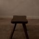 Vintage wooden stool in organic shape