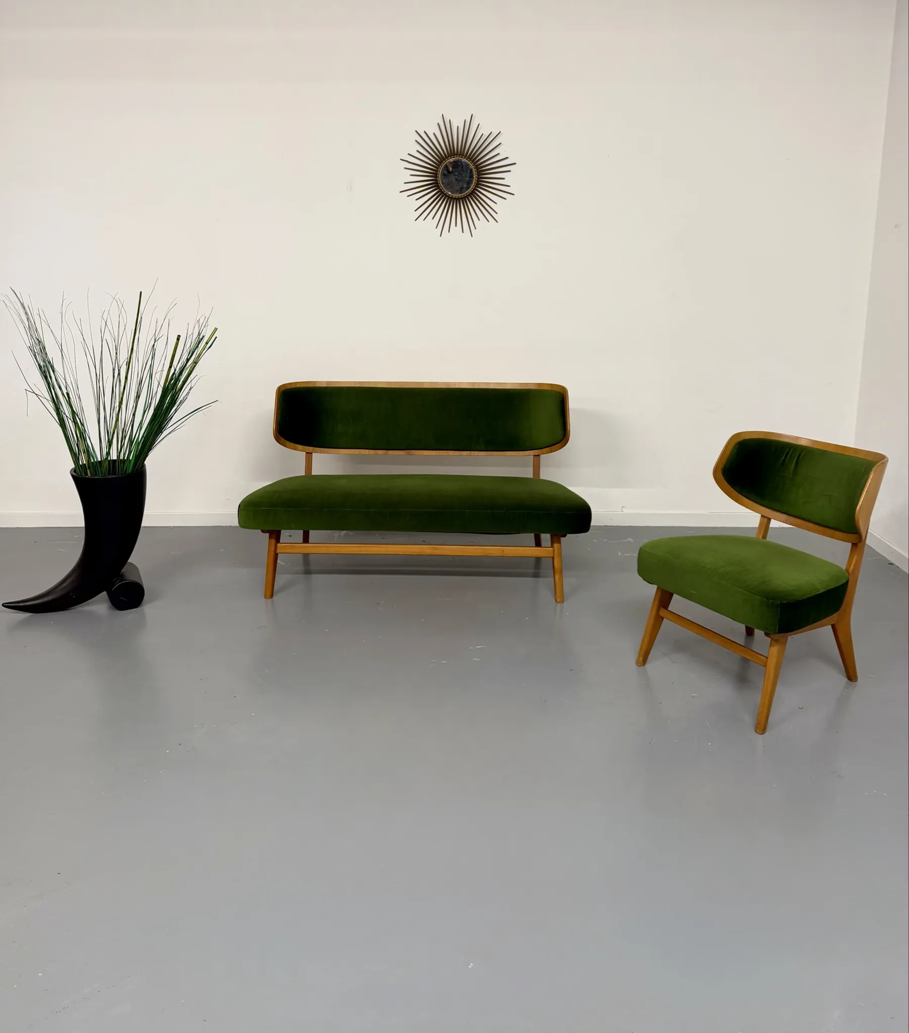 Sofa and armchair designed by Herta-Maria Witzemann, moulded wood, 1960s.