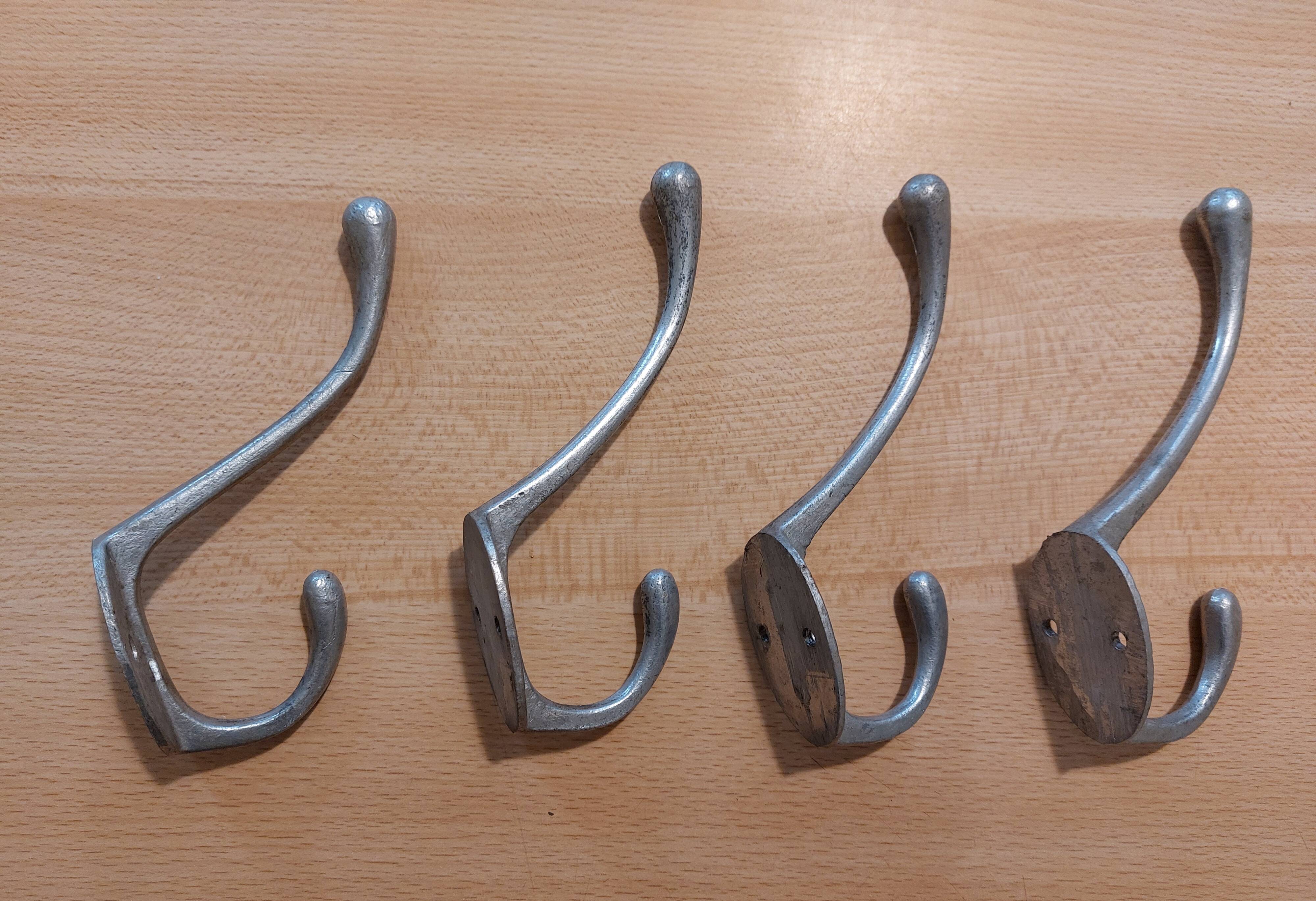 4 old aluminum hooks 30s