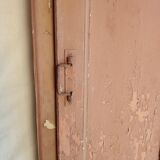Old glazed door with its shutter