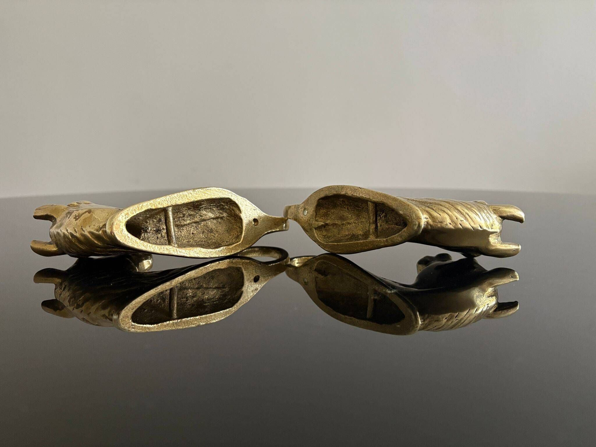 Pair of bronze coat hooks - Italy, 1950s