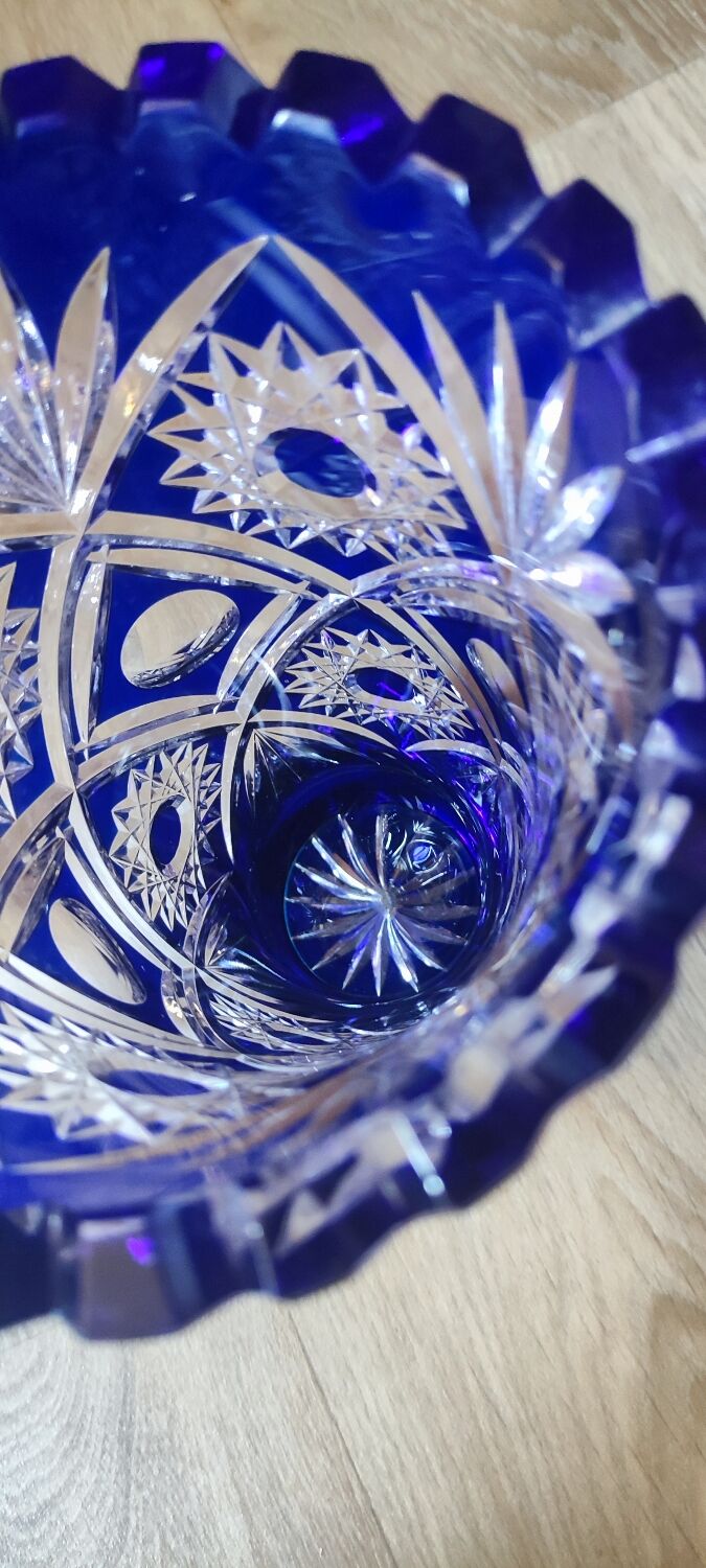 Bohemian vase in cut crystal with blue overlay.