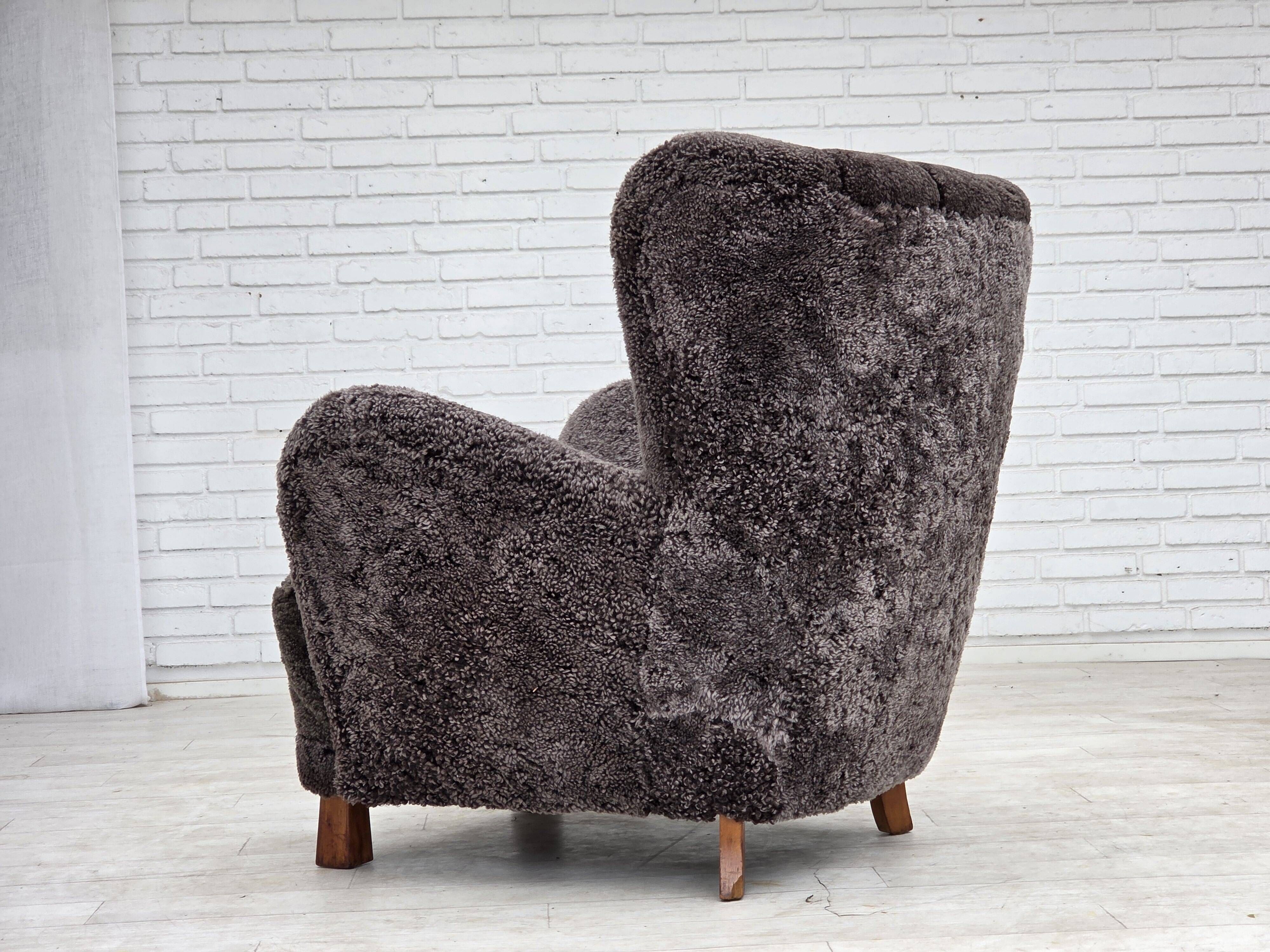 1960s, Danish design, reupholstered armchair, genuine sheepskin.