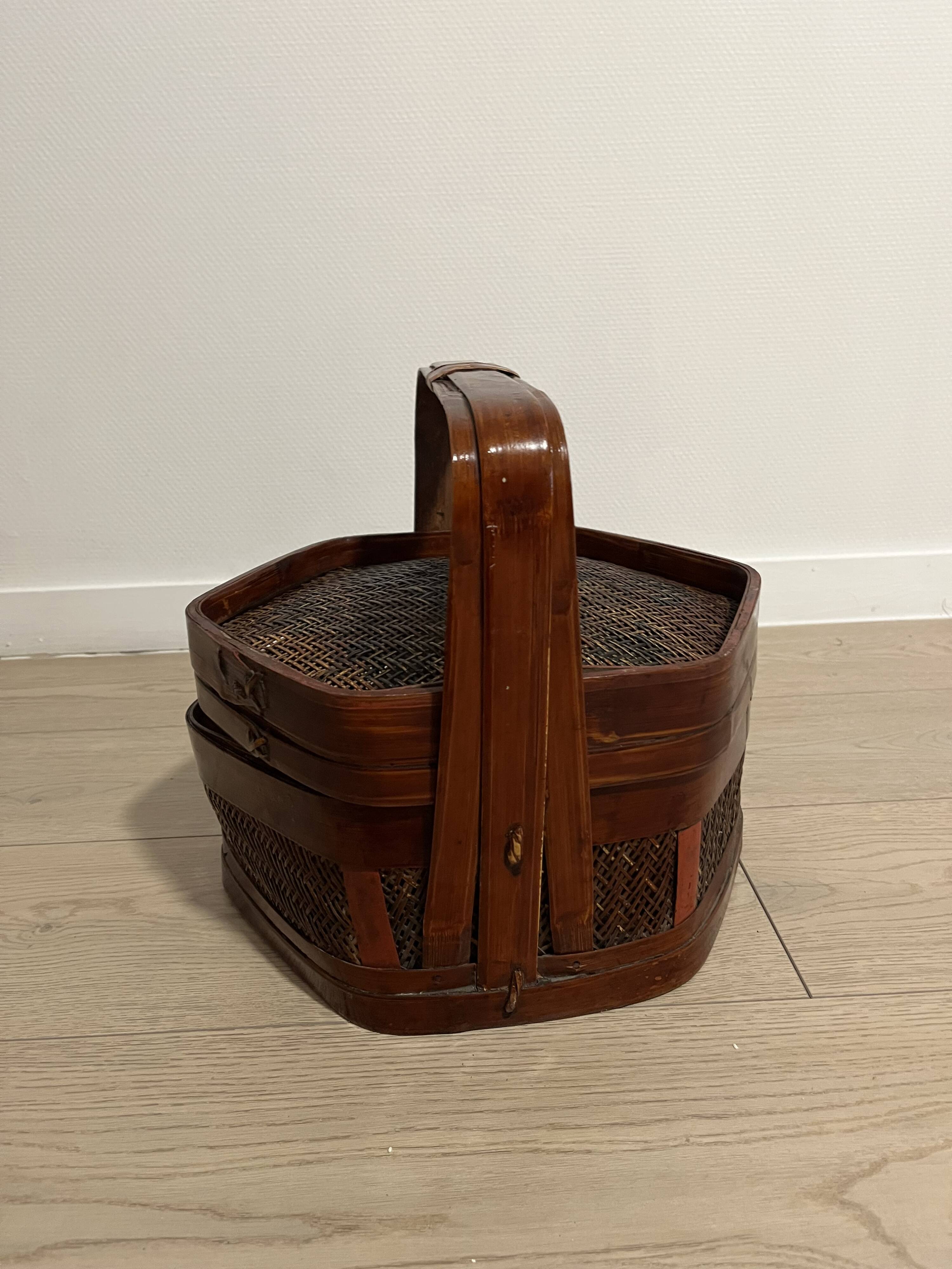 Ancient wooden and woven wicker basket,