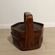 Ancient wooden and woven wicker basket,