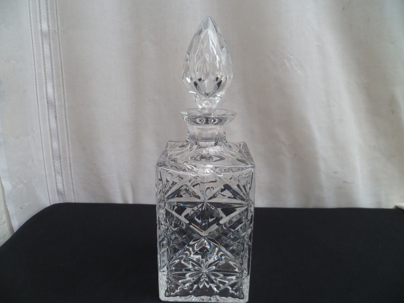 A molded Crystal whiskey decanter