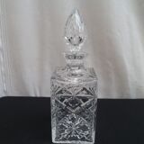 A molded Crystal whiskey decanter