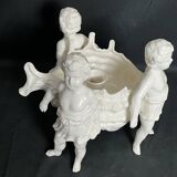 Porcelain, centerpiece with candle holder decorated with putti, 20th century