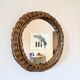 Round mirror in 60s design woven rattan