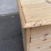 Victorian commode from the 19th century stripped to raw solid wood with ceramic knobs.