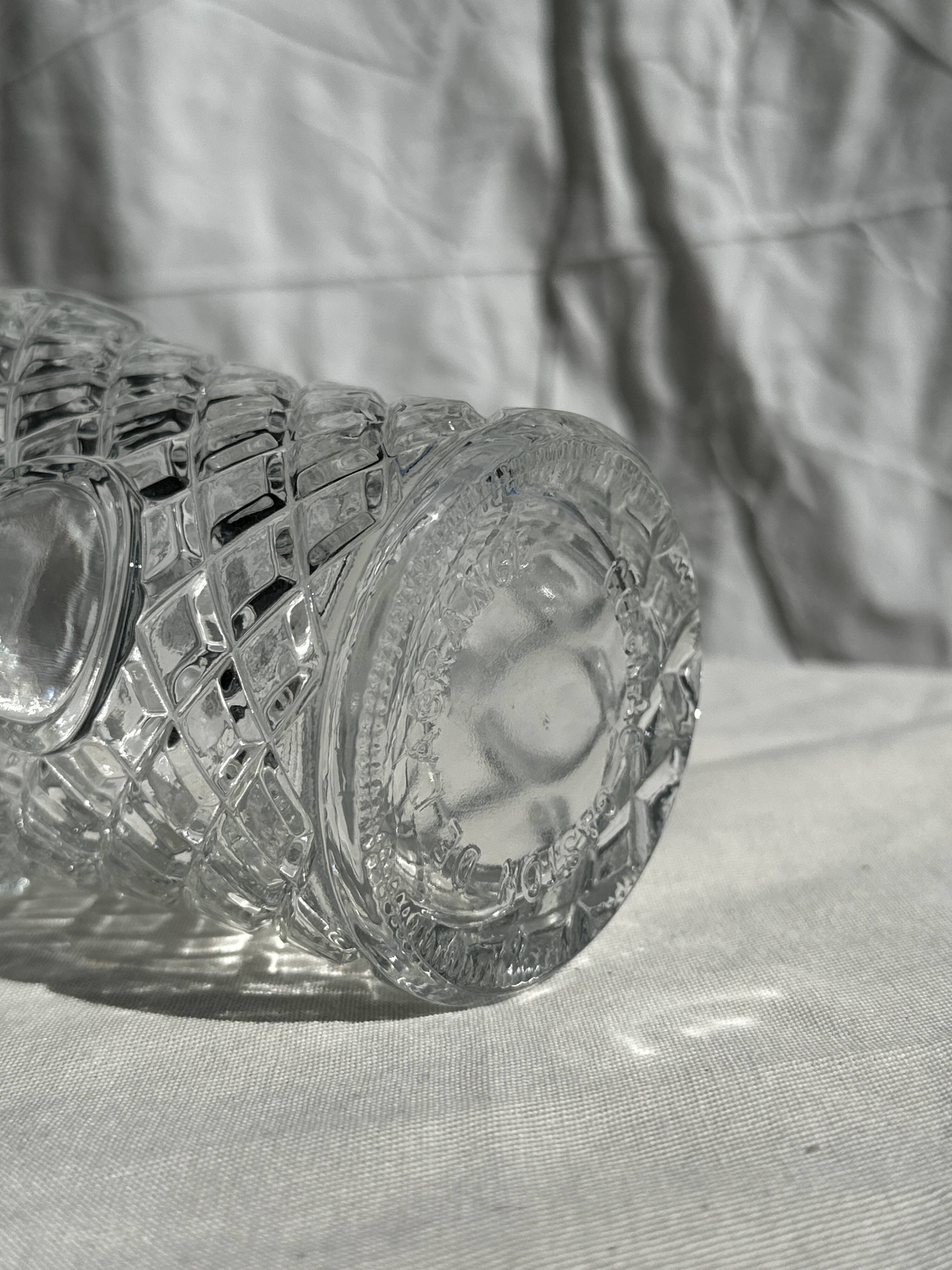 Small cylindrical glass whiskey decanter H:23