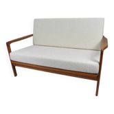 1960s canapé, in teak and white boucle.