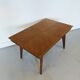 Vintage Scandinavian wooden dining table with tapered legs.