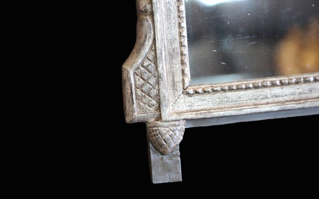 Small mirror, silver-leafed wood