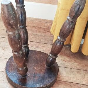 Wooden tripod stool