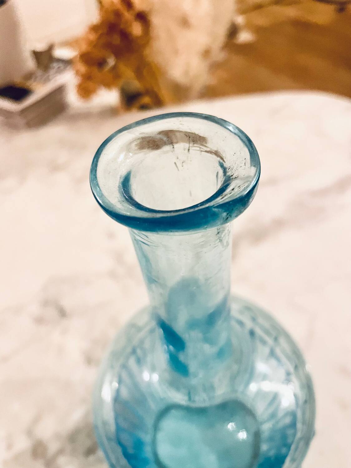 Bouteille bleue en verre
