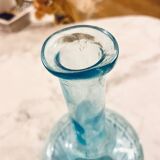 Bouteille bleue en verre