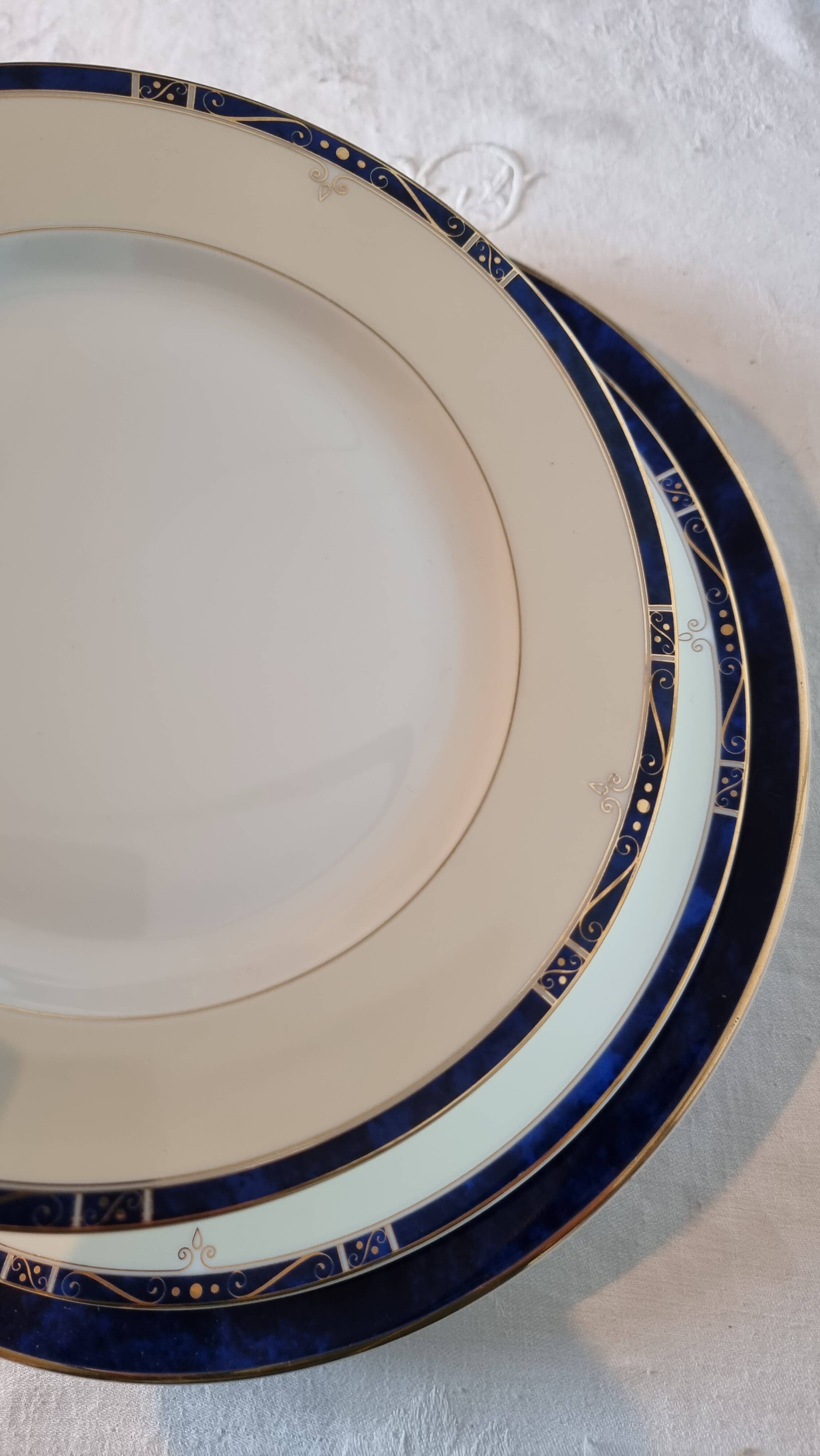 18-piece porcelain dinnerware set from Limoges by Philippe Deshoulières.