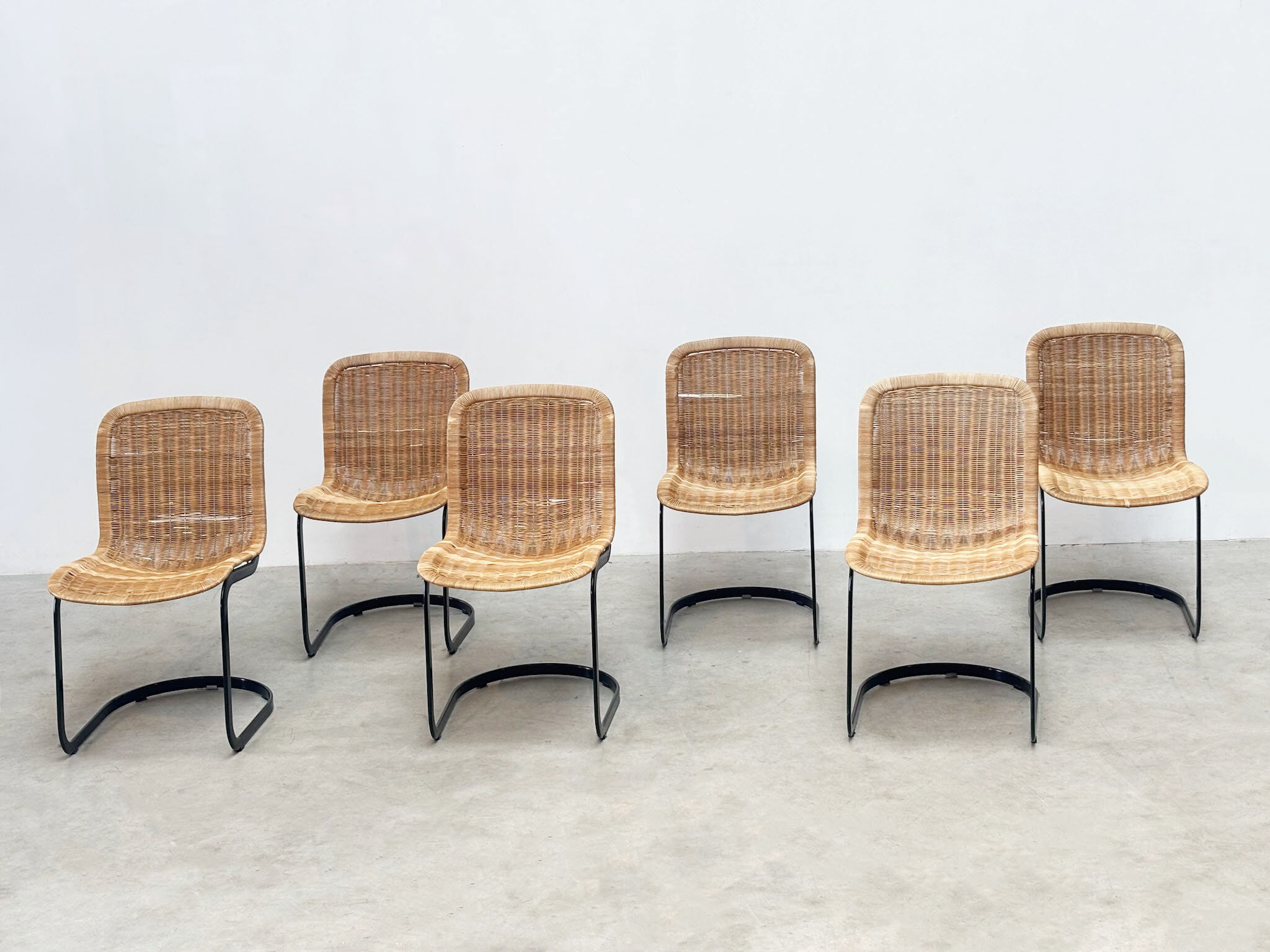 Set of six Cidue rattan dining chairs