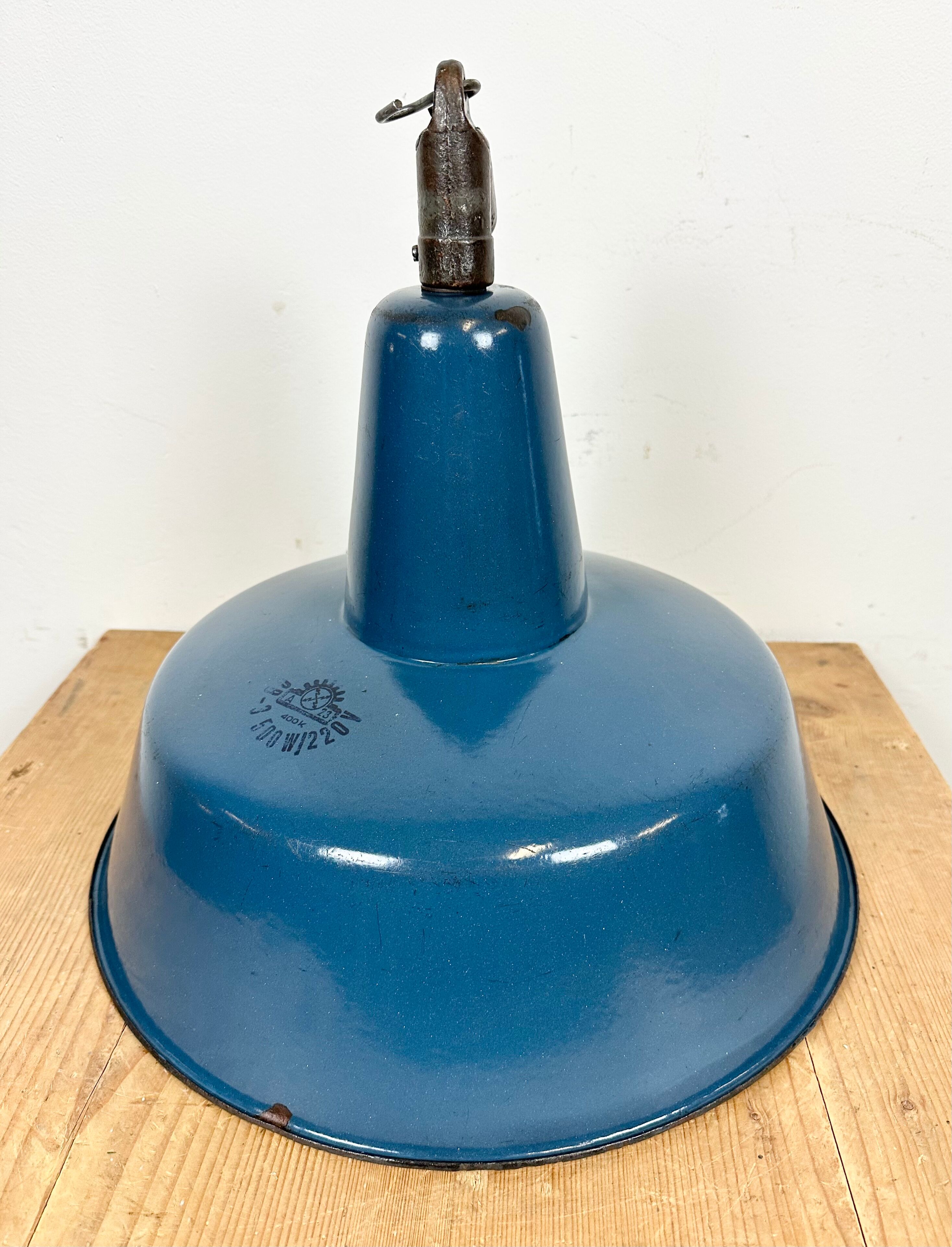 Industrial blue enamel factory lamp with cast iron top, 1960s