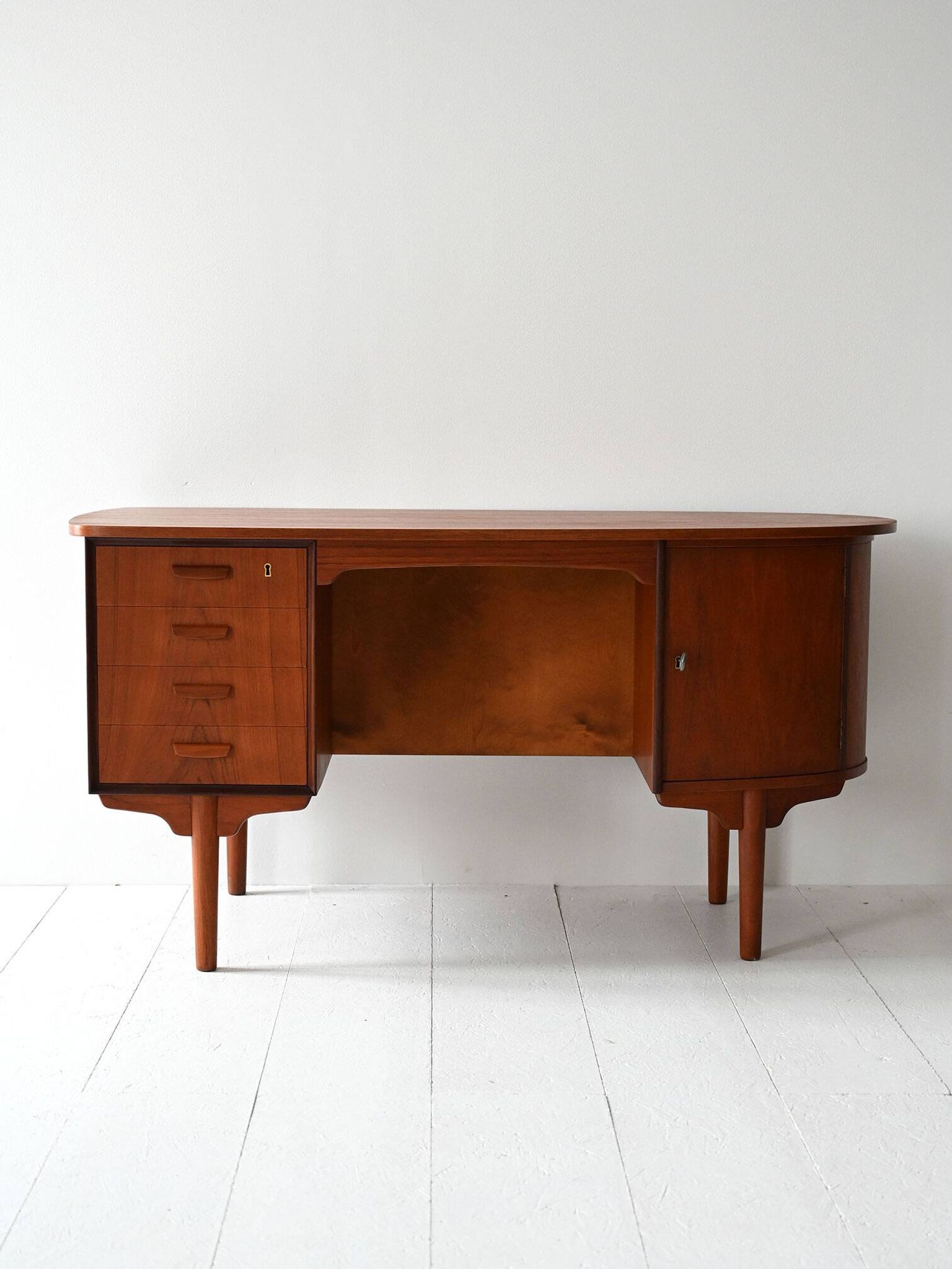 Scandinavian oval desk in teak from the 1960s.