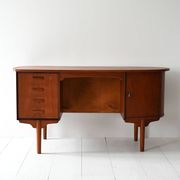 Scandinavian oval desk in teak from the 1960s.