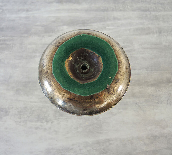 Old metal push candle holder