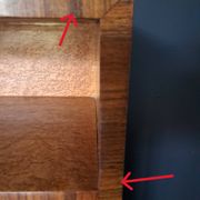 Art Deco cabinet in speckled maple veneer with asymmetrical shelves.