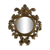 Old mirror in gilded wood