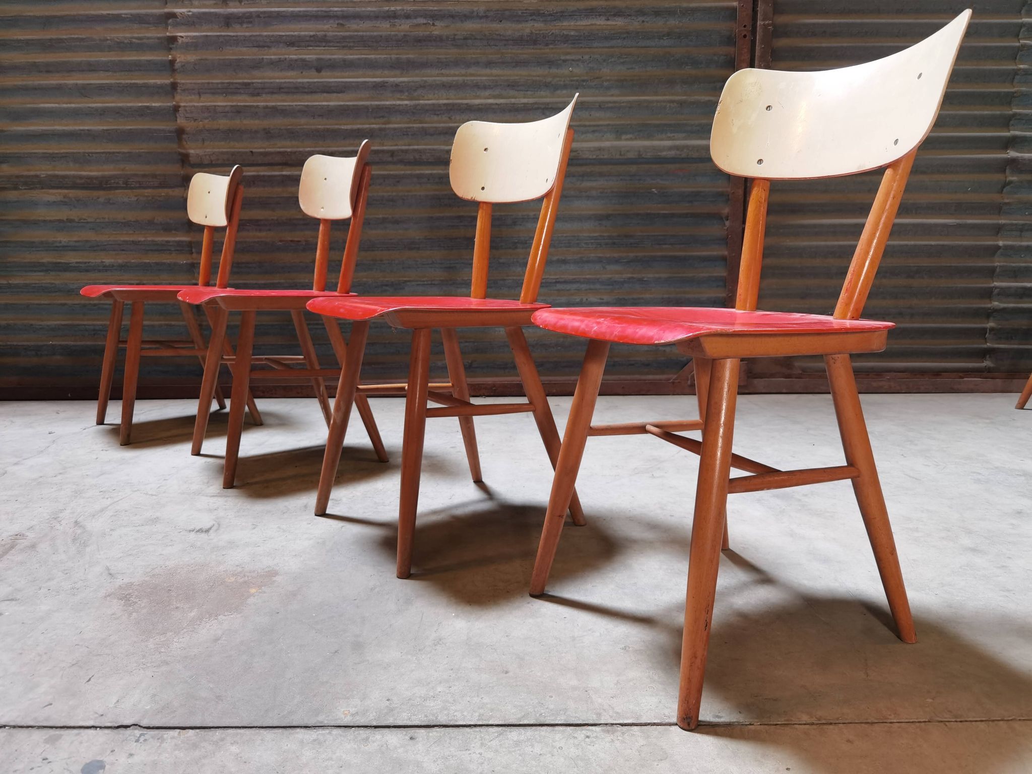 Set of 4 red wooden chairs published by Ton, 60s