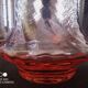 Art Deco orangeade service in pink-orange glass, twisted model.