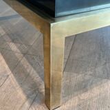 Coffee table in brass and black lacquer by Guy Lefèvre for Maison Jansen