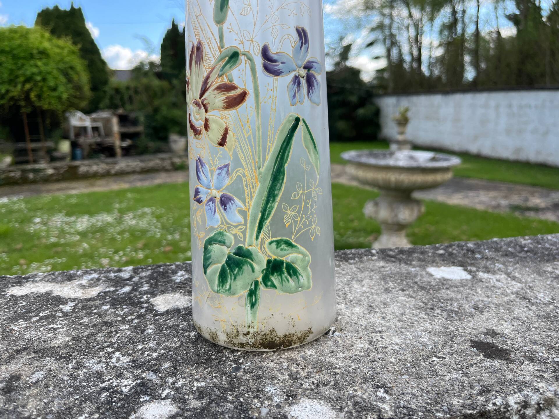 Cylindrical Art Nouveau vase with enamelled decoration of violets.
