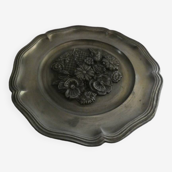 pewter plate with flower decoration