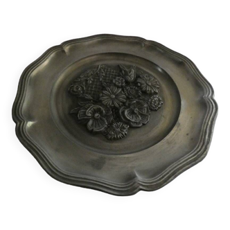 pewter plate with flower decoration