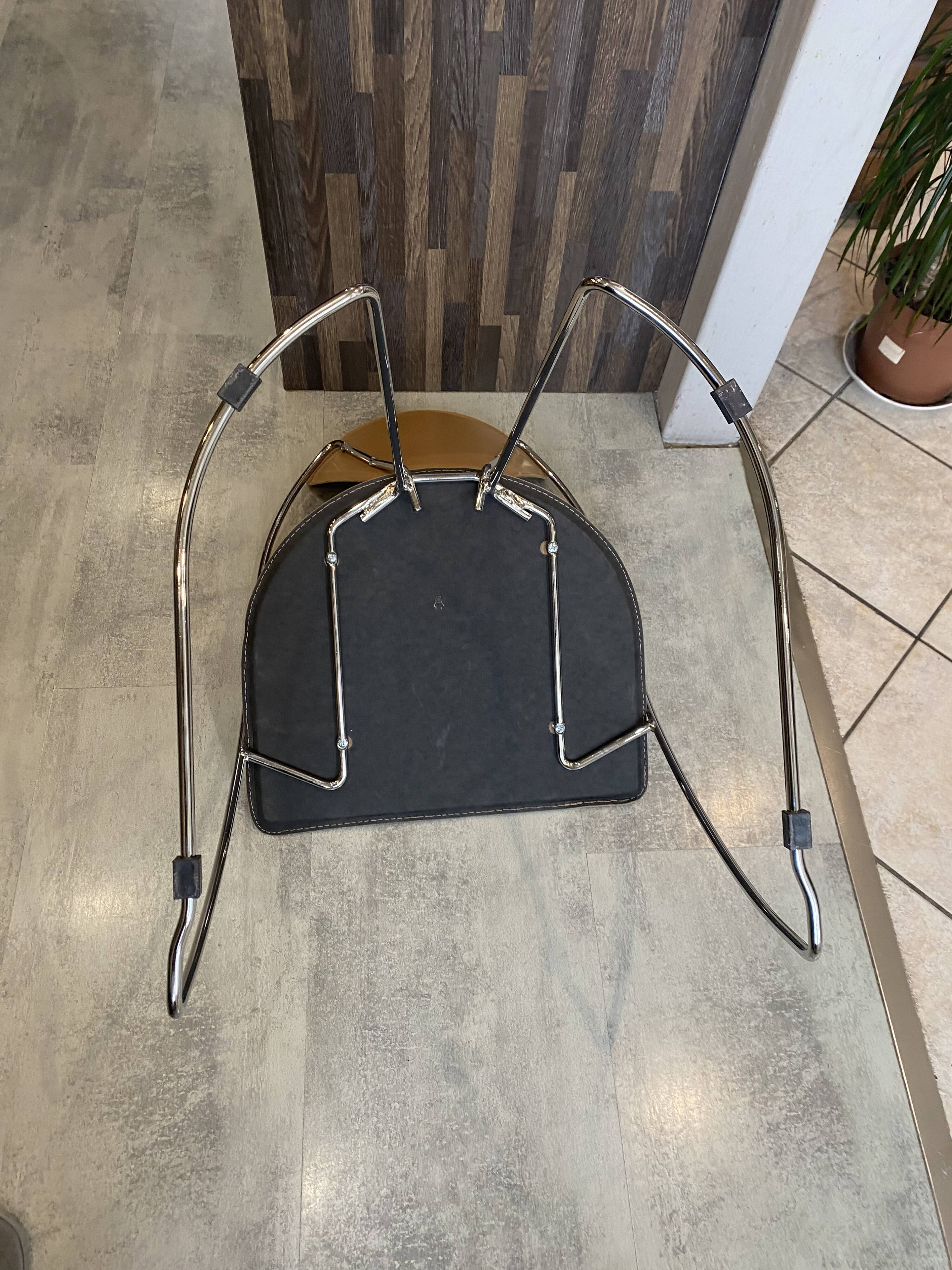 1 Linda armchair chair by Arrben in camel brown leather with a chrome steel frame.