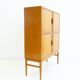Large Swedish mahogany storage unit with four front doors.