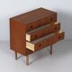 Danish teak chest of drawers, 1960s – 4 drawers, key and recessed handles