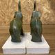 Pair of art deco bookends with elephant decoration in regulated and travertine, vintage