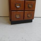 Antique oak apothecary cabinet with drawers