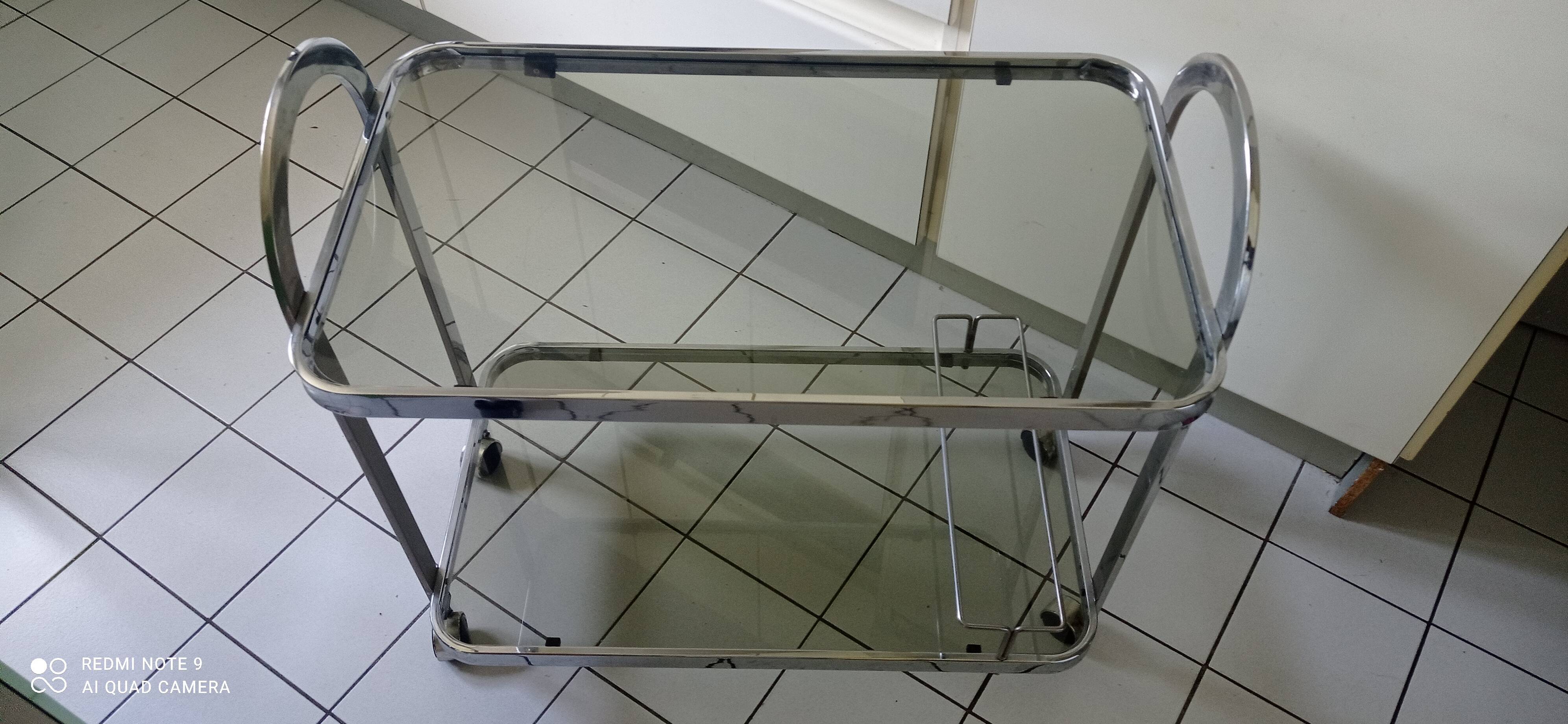 Vintage rolling trolley in smoked glass