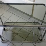 Vintage rolling trolley in smoked glass