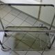 Vintage rolling trolley in smoked glass