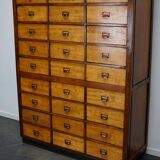 School cabinet bank of vintage Dutch drawers in mid-twentieth century pine