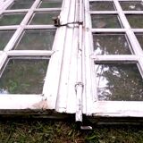 Pair of early 19th century white wood castle windows