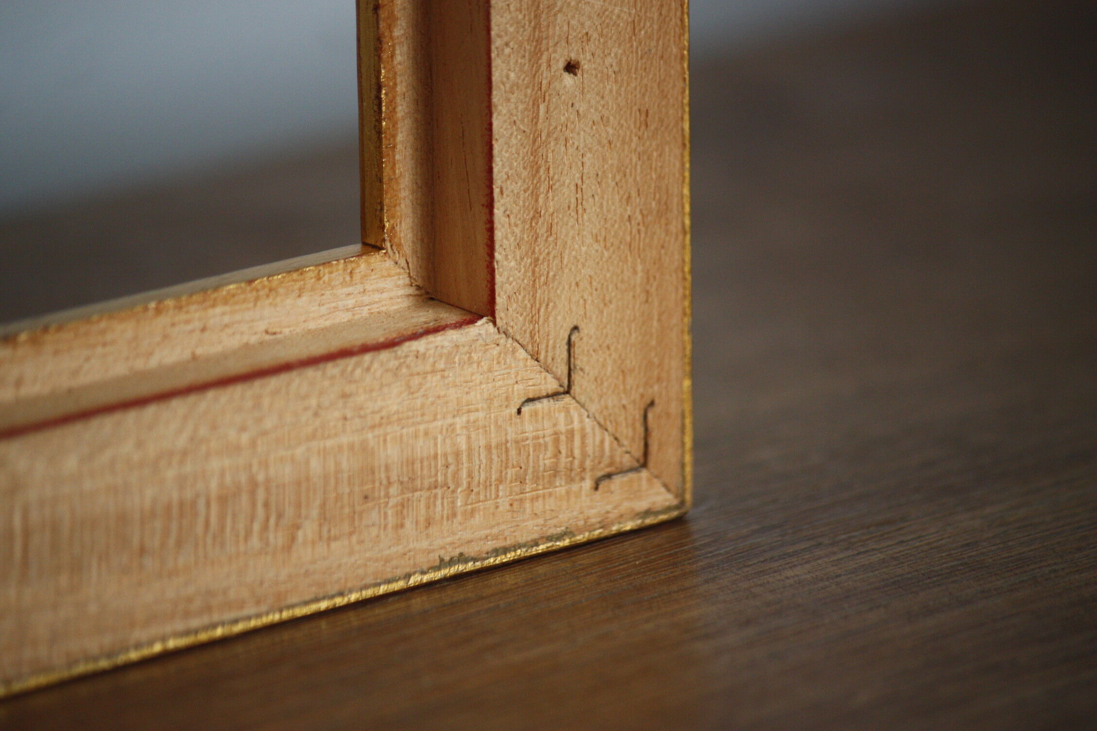 Carved and moulded gilded wood frame