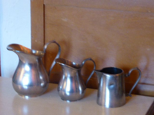 Coffee set in silver metal composed of 3 pitchers, Millan Freres, Paris