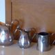 Coffee set in silver metal composed of 3 pitchers, Millan Freres, Paris